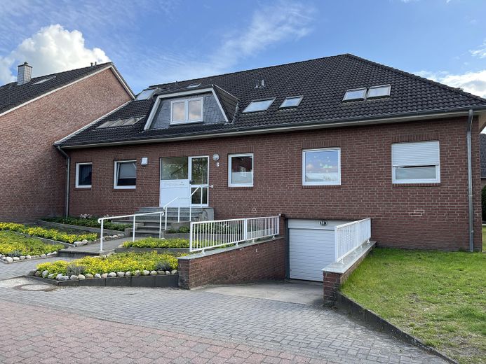 Appartement modernisé de 4 pièces avec terrasse orientée sud, place de parking en garage souterrain et liaison en tramway vers HB – Aussenansicht