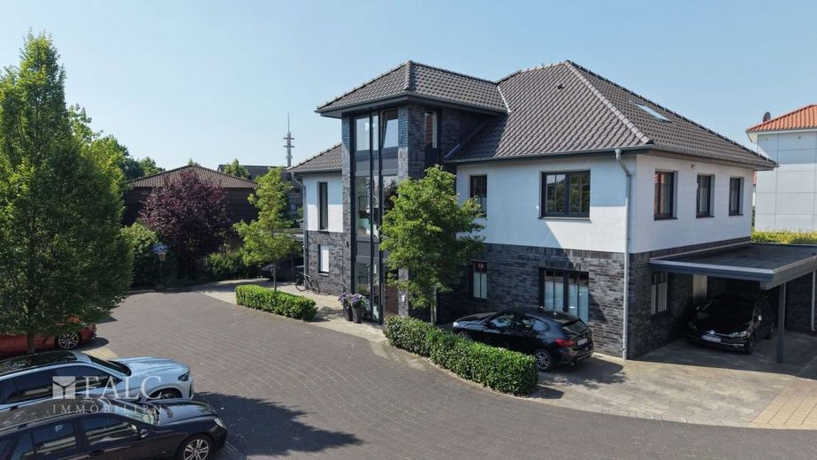 Moderne 3 -Zimmer-Wohnung mit Smart-Home, Dachterrasse &amp; hochwertiger Ausstattung – Außenansicht