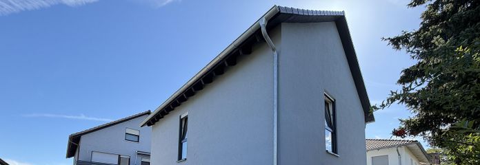 Élégant appartement de 2 pièces avec jardin privatif et équipements modernes – Hausansicht 1 Eingang