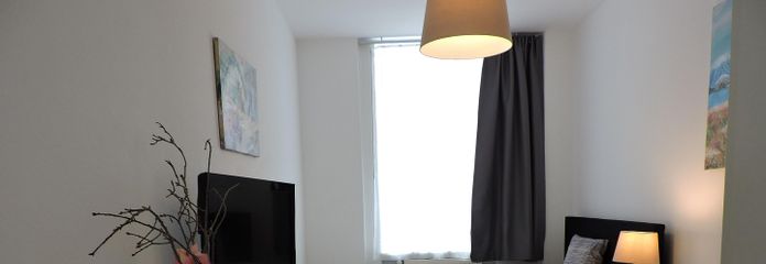 City-Wohnung möbliert +++ 1A-Lage hinter dem Rathaus – Wohn-/Schlafbereich