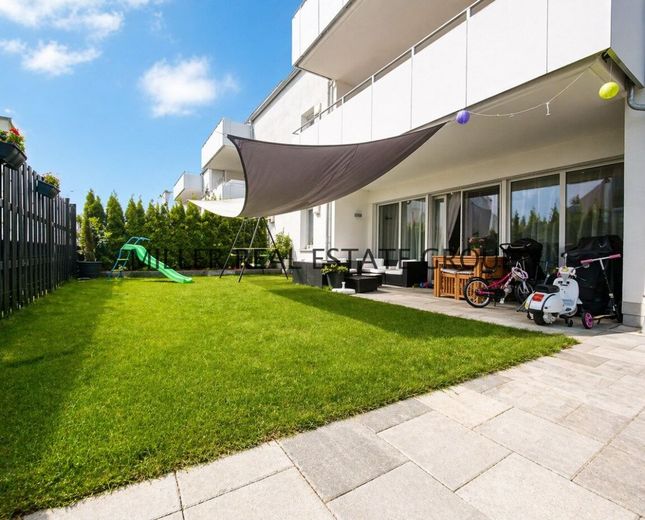 Moderne 4-Zimmer-Erdgeschosswohnung mit Privatgarten, Terrasse &amp; zwei Tiefgaragenstellplätzen! – Gartenbereich