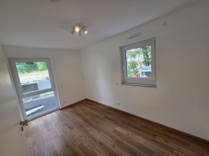 Neubau - Erstbezug - sofort verfügbar! Exklusive 2-Zi-Wohnung mit EBK und Garten sowie Tiefgarage – Schlafzimmer