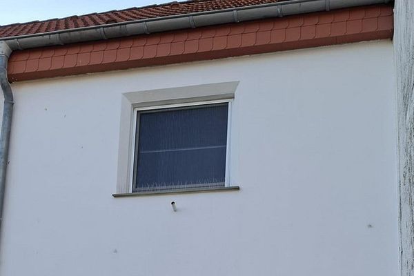 Attraente casa a schiera con mansarda ampliata