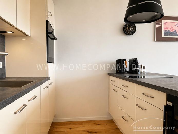 Erstbezug nach Komplettsanierung – Hochwertiges Executive-Studio mit Alpenblick in Schwabing – 18279870a5e54fa45779a613c7e825f1ccffd419.jpg