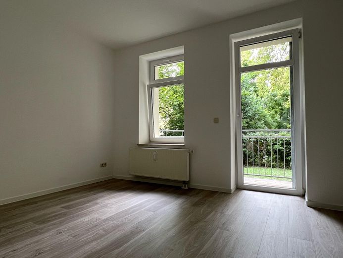 Schlafzimmer mit Balkonzugang