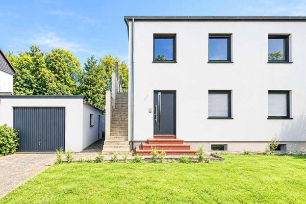 Wohnen & vermieten: Kernsaiertes Haus mit zwei Wohneinheiten in Leverkusen