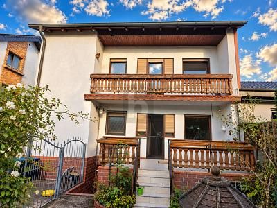 TWEE WONINGEN, ÉÉN THUIS