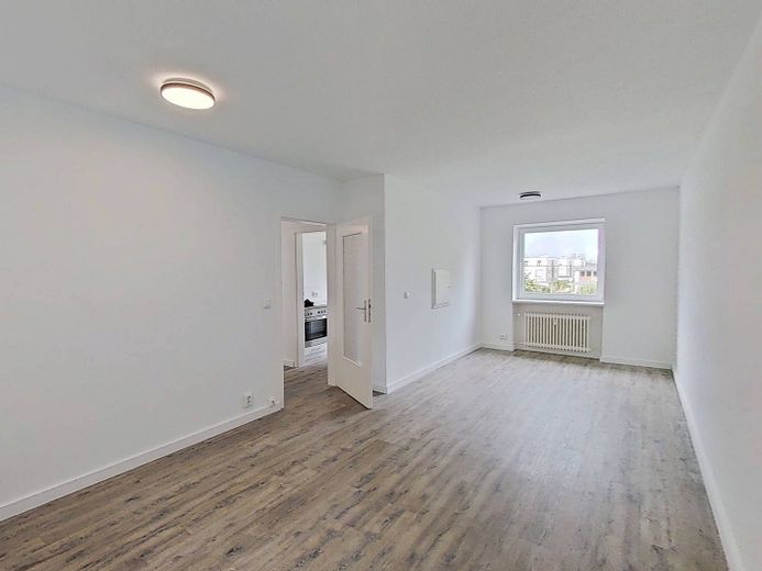 EINZIEHEN UND BIS ZU 3 KALTMIETEN SPAREN: Große 3-Zimmer-Wohnung mit BALKON und EBK in Kappeln-Ellenberg – Ansicht III: Wohn- und Esszim…