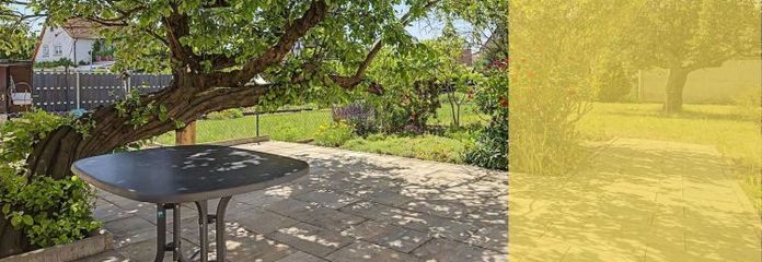 Casa adosada para familias con jardín y edificio anexo