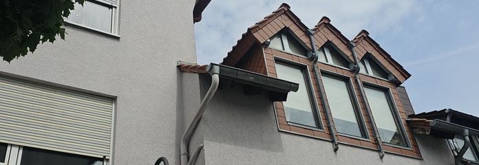 Neubauteil mit Spitzdachgauben