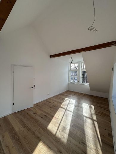 Hochwertige Wohnung mit Wärmepumpe & Einbauküche - Neubau KfW-40 Erstbezug Innenstadt Diepholz –  Küche & Wohnzimmer