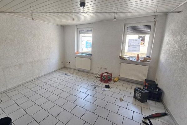 Casa curata per 2-3 famiglie con ampio giardino a Mannheim-Käfertal