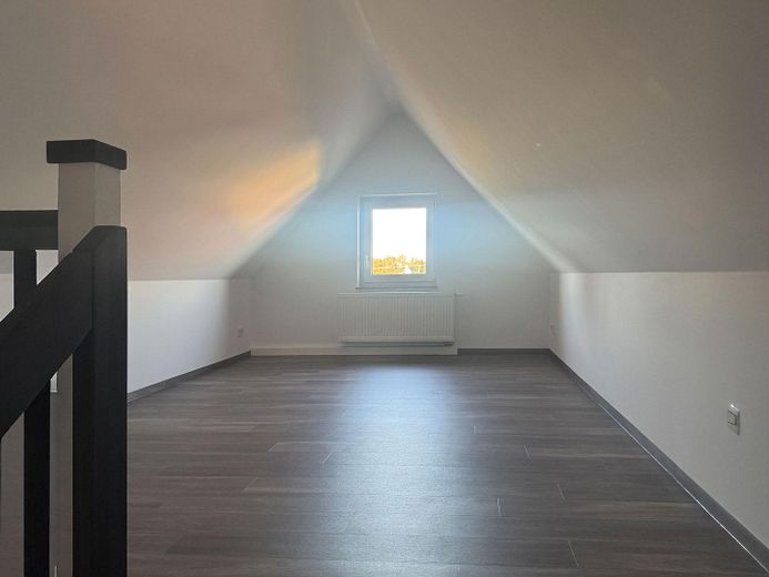 Almost finished: semi-detached house with garden & fireplace near Dresden – Spitzboden
