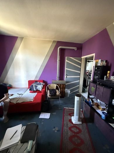 7,2 % Rendite in Kernstadtlage – Renovierungsbedürftig und vermietet – Wohnzimmer