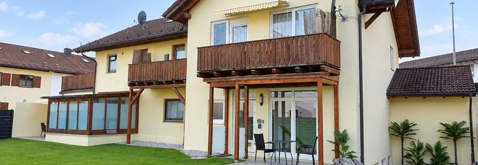 Mehrfamilienhaus in zentraler Lage mit 4 Wohnungen – Gartenansicht