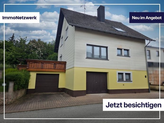 1‑Familienhaus mit Ausbaupotenzial: Garten, Südterrasse, 2 Garagen & optionale 2. Wohneinheit – Foto 1