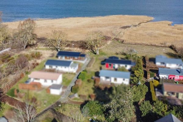 Idyllischer Bungalow am Bodden – kleines Refugium mit Dachterrasse und Wasserblick