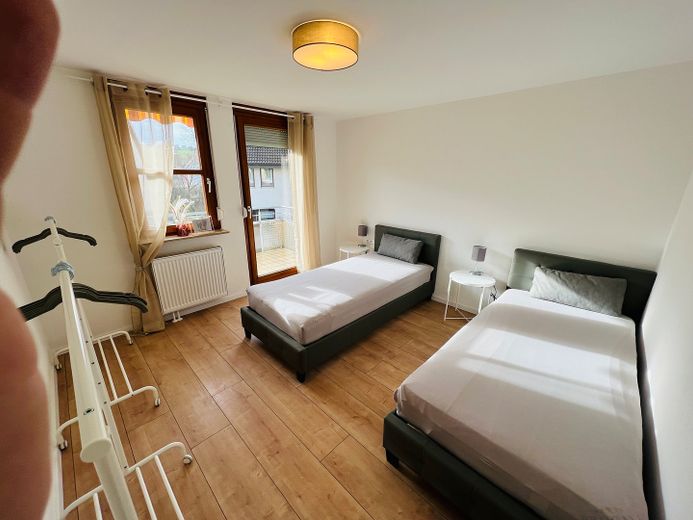 Schlafzimmer mit Balkon