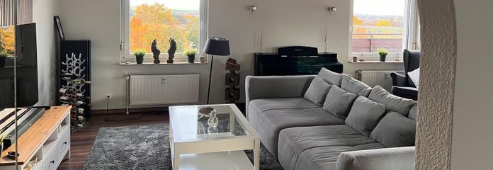 Penthouse sur les toits de Wolfenbüttel – Blick ins Wohnzimmer