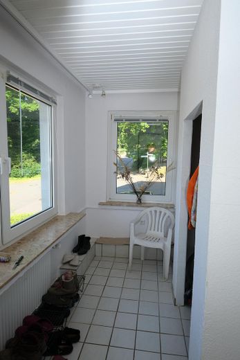 Einfamilienhaus im schönen Osterwald mit schöner Aussicht – Windfang Eingang