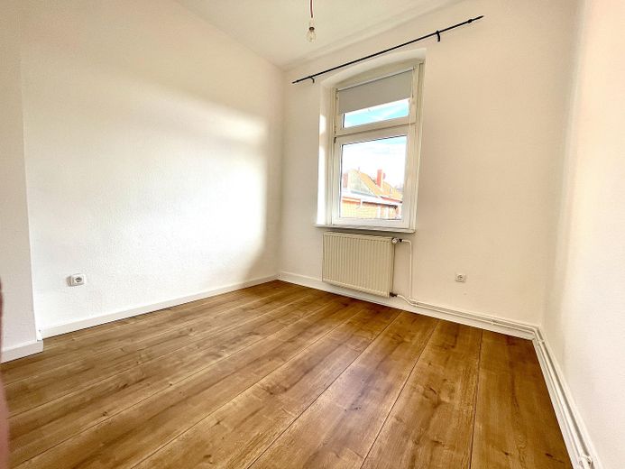 Stilvolles City-Apartment mit Bahnhofsnähe: Komfortables Wohnen in Lüneburg – Schlafzimmer