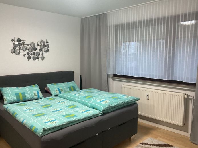 Vermietete Kapitalanlage: 3-Zimmer-ETW mit Loggia &amp; Tiefgaragenstellplatz in Minden! – Schlafzimmer