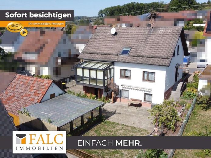 Gepflegtes Zweifamilienhaus mit großzügigem Grundstück, Wintergarten und Garten – Foto 1