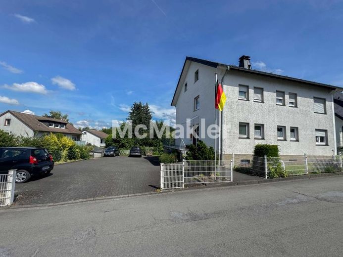 Vollvermietetes Dreifamilienhaus mit Entwicklungspotenzial in begehrter Wohnlage – Foto 1