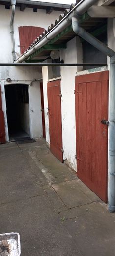 Sanierungsbedürftiges Reihenmittelhaus mit Nebengelass und Garage – Foto 2