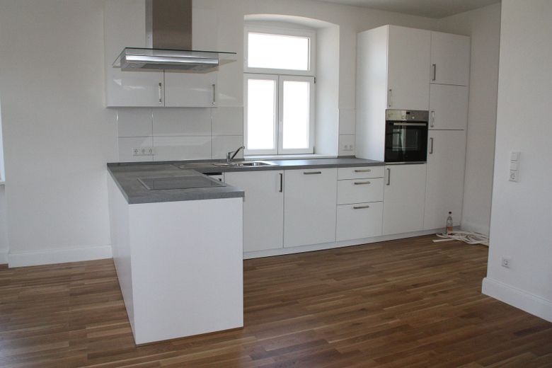 Ampio soggiorno-pranzo in un affascinante appartamento duplex – Küche