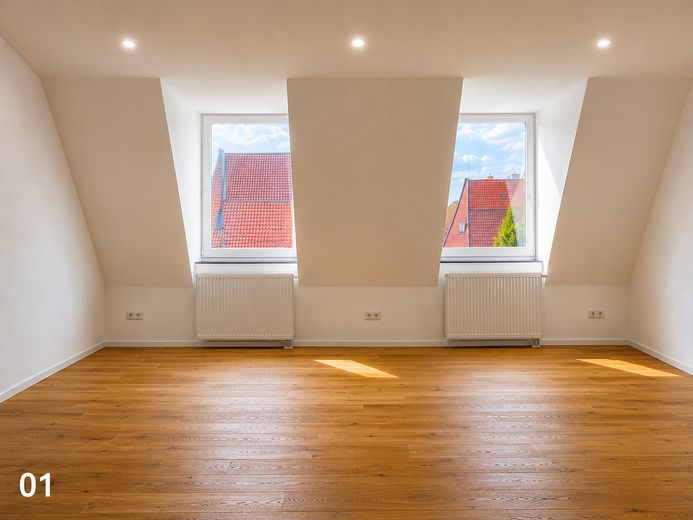 Exclusive living at Münsterplatz – high-quality fully renovated apartment with elevator and underground parking garage – Photo 1