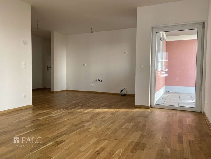 Hochwertige 2-Zimmer-EG-Wohnung mit Terrasse - Langfristig vermietet &amp; barrierefrei zu verkaufen! – Wohnzimmer mit Küche
