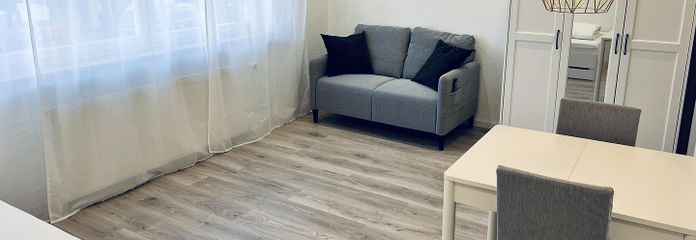 Moderne vollmöblierte 1-Zimmerwohnung mit Blick in die Stadt