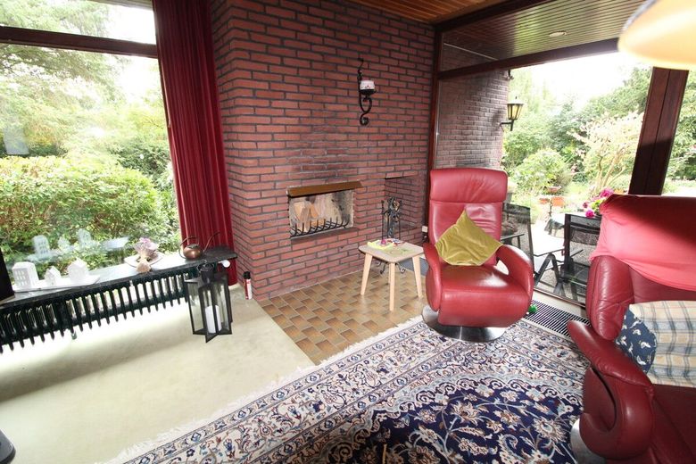 Individueller Flachdach-Bungalow mit Doppelgarage &amp; Parkähnlichem Grundstück in Schiffdorf-Sellstedt – 14 - Innenkamin