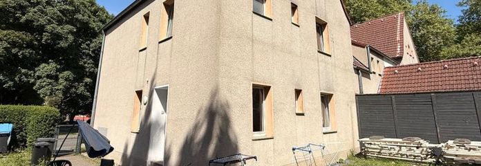 Solid 3-unit house with building plot in Gelsenkirchen-Buer – quiet location & potential!