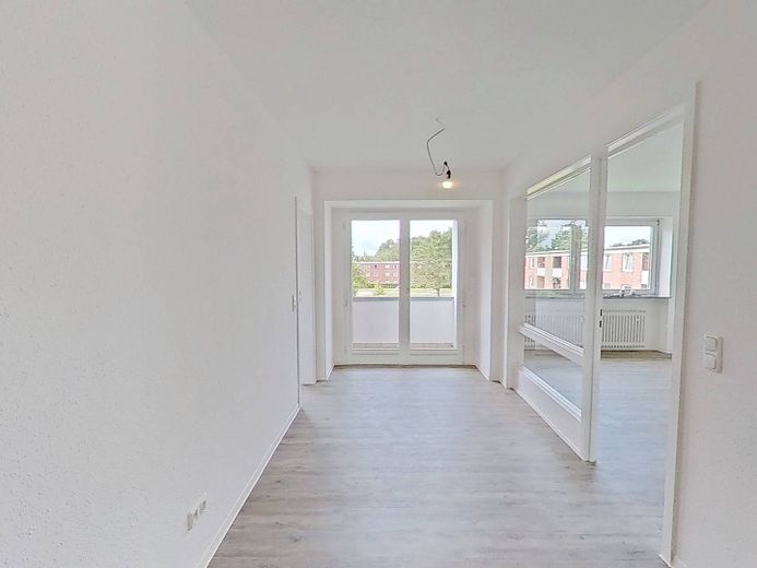BIS ZU 3 NKM FREI: Schöne 3-Zimmer-Wohnung mit BALKON und intelligentem Grundriss in Kappeln-Ellenberg – Ansicht I: Flur