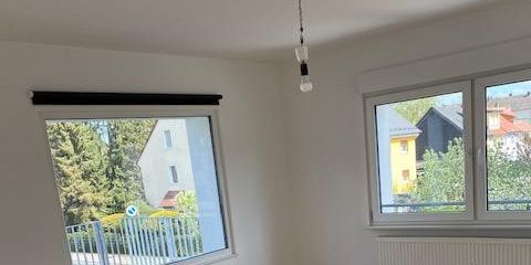 Großzügige und hochwertig modernisierte 3-Zimmer-Wohnung mit 2 Balkonen, Einbauküche und Garage