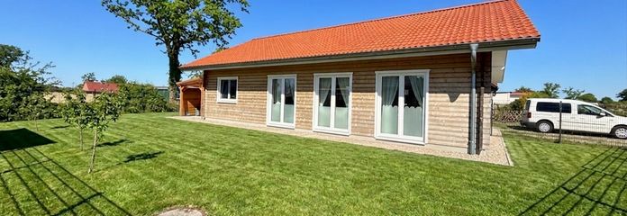 Jak nowy drewniany bungalow klasy A+ w pobliżu Eidery – ogród, widok na pola, bez prowizji – Fensterfront Richtung Süden 