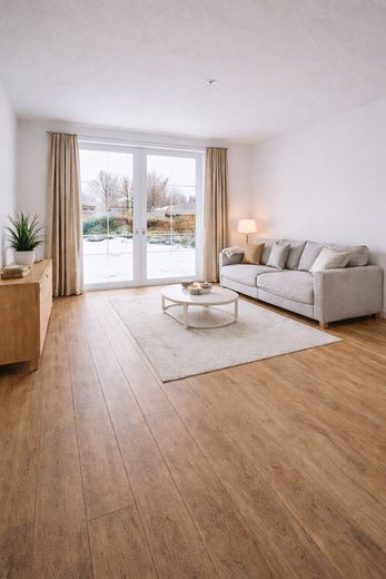 Exklusives Reihenendhaus – Erstbezug nach aufwendiger Sanierung mit PV-Anlage & sonnigem Garten – Wohnzimmer Beispielbild