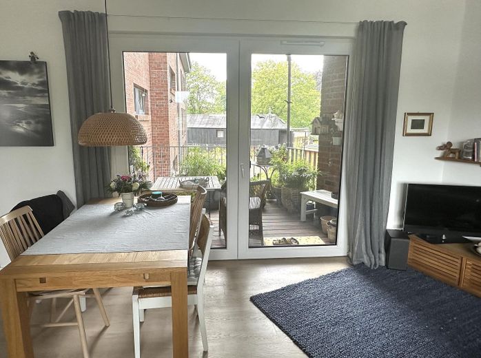 2-Zimmer-Wohnung in Glückstadt am Batardeau (62 qm) – Essecke mit Blick auf Balkon