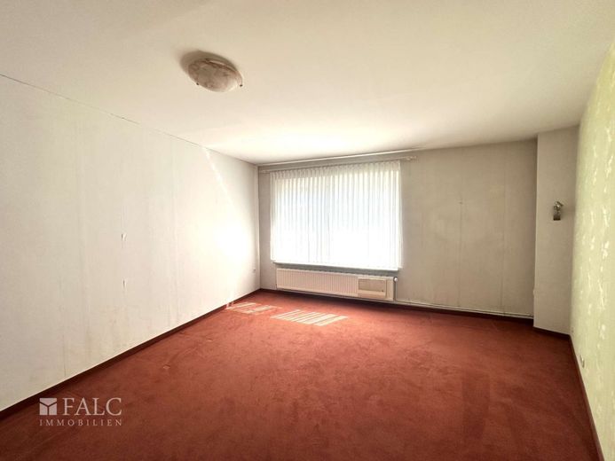 Einfamilienhaus mit Einliegerwohnung und Baugrundstück in zentraler Lage von Himmelpforten – Schlafzimmer EG