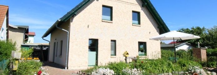 Einfamilienhaus in Polchow auf Rügen - Wohnen auf 3 Ebenen in erster Wasserlage am Bodden