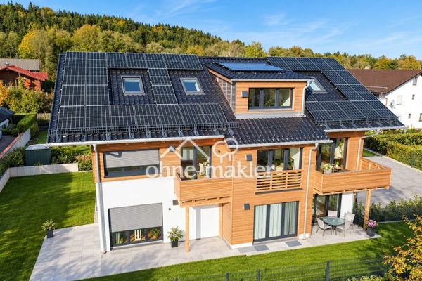Doppelhaushälfte in Holzmassivbauweise – KfW 40 Plus, ca. 150 m², S/W-Garten & beheiztes KG