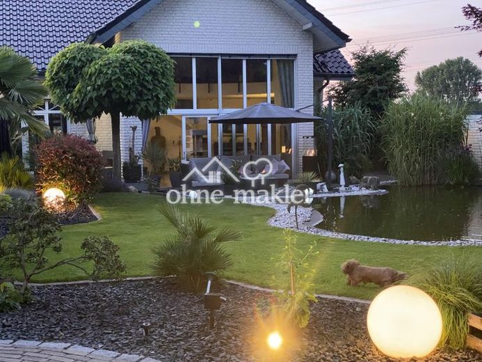 Exklusives Einfamilienhaus mit Wellnessgarten – Wohnen auf höchstem Niveau – Foto 1