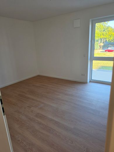 Erstbezug: Moderne Obergeschosswohnung mit Balkon sowie energieeffizientem Wohnkomfort – Schlafzimmer