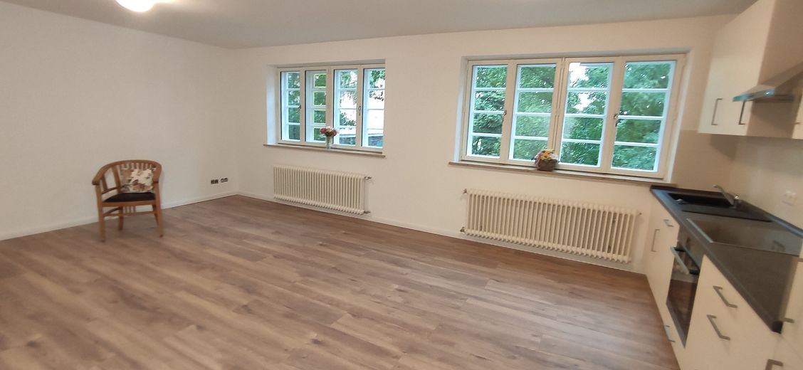 Wohnzimmer mit Küche
