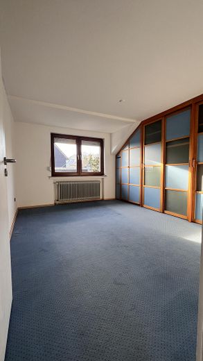 Schlafzimmer mit Einbauschrank