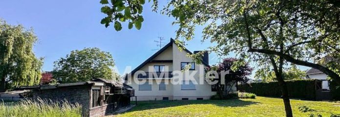 Großzügiges Zweifamilienhaus mit Traumgarten, Balkon, Wintergarten & Doppelgarage