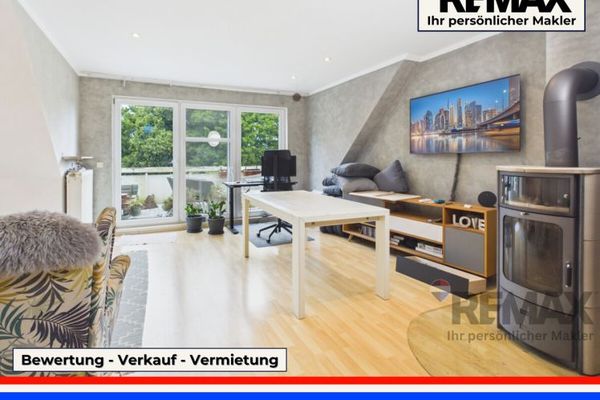 Großzügige Dachgeschoss-Maisonettwohnung mit Sonnenbalkon und Kaminofen in Laboe