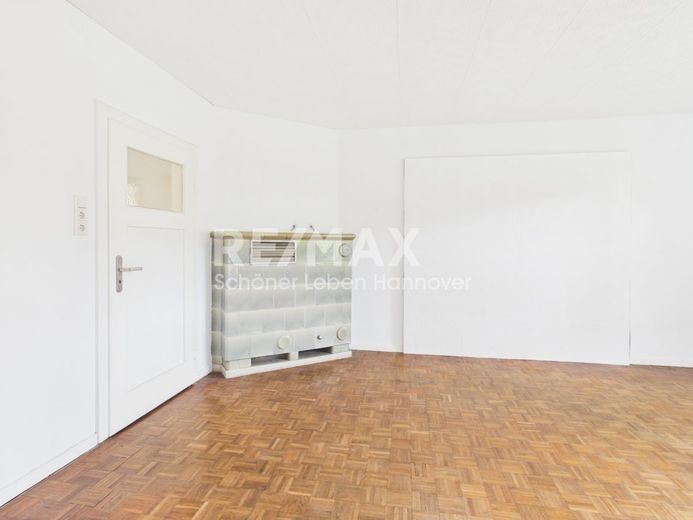 Resthof mit 3.642 m² Grundstück in Springe OT Alversrode – Wohnzimmer Kaminofen